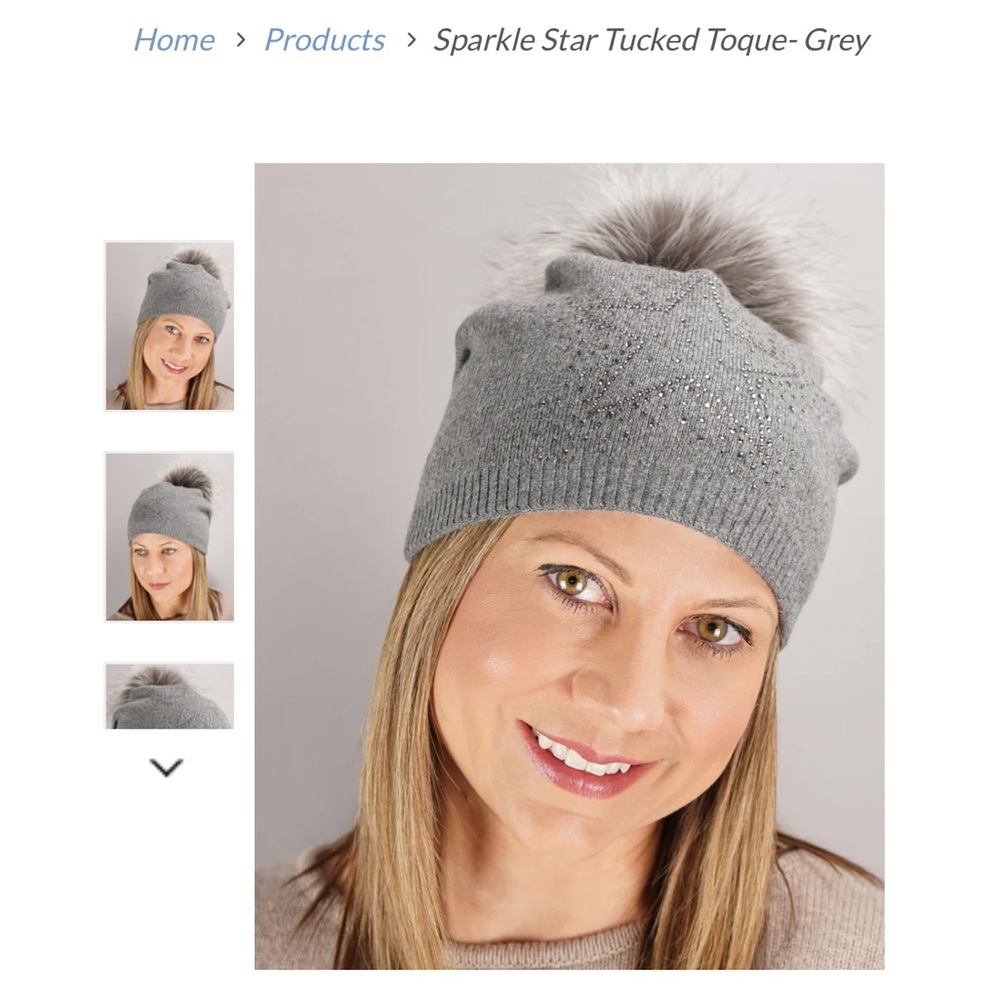 Grey Snowflake Pom Pom beanie. Genuine Fox